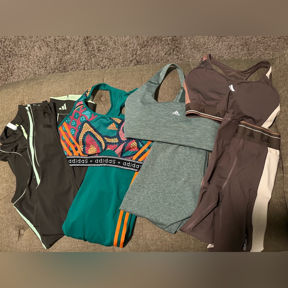 Four Adidas activewear sets